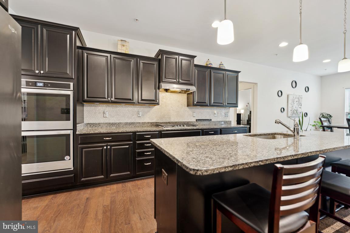 12606 Broughton Bluff Brandywine, MD 20613 - Photo 14 of 55 Double oven and gas cooktop.