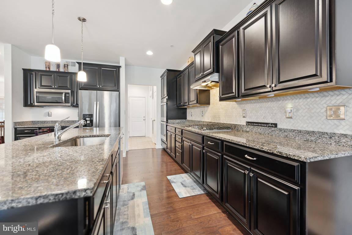 12606 Broughton Bluff Brandywine, MD 20613 - Photo 15 of 55 Kitchen facing walk-in Pantry, Laundry, and Garage