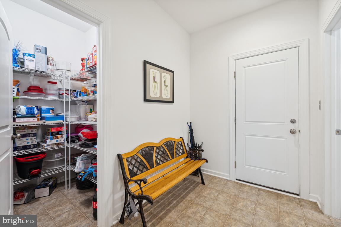 12606 Broughton Bluff Brandywine, MD 20613 - Photo 21 of 55 Walk-in Pantry for even more storage, garage door