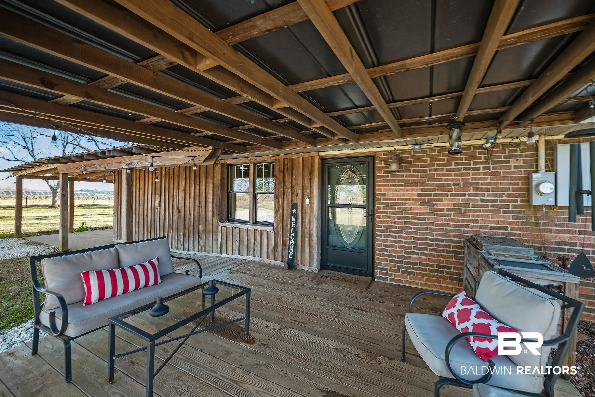 110 Sam Jones Road Atmore, AL 36502 - Photo 11 of 47 View of wooden deck