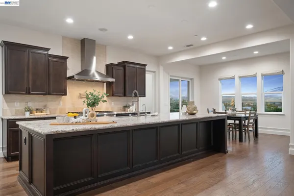 a kitchen with a stove and a microwave