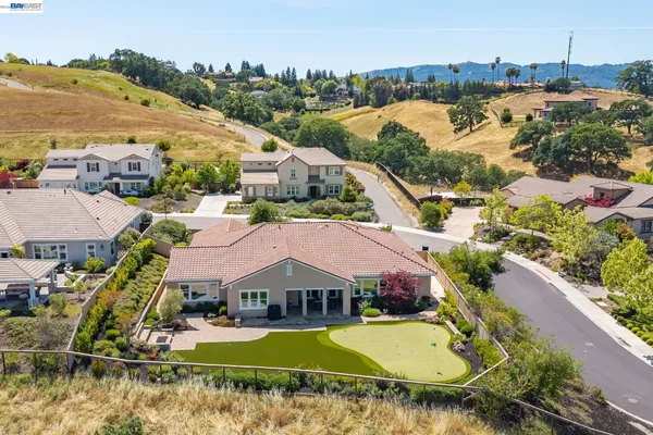 an aerial view of a house with a garden