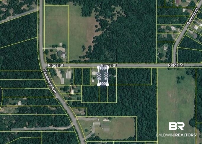 Aerial map of property and surrounding area featuring property boundaries highlighted