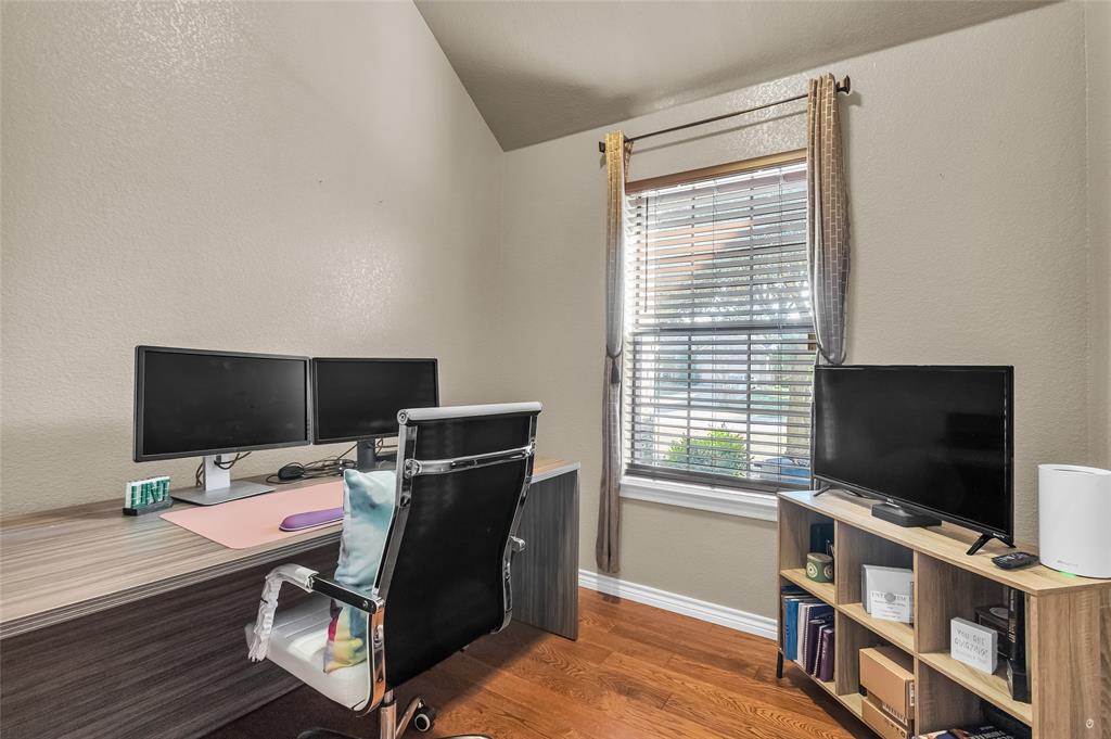 226 King George Road Ponder, TX 76259 - Photo 34 of 39 Office featuring a textured wall, dark wood finished floors, plenty of natural light, and lofted ceiling