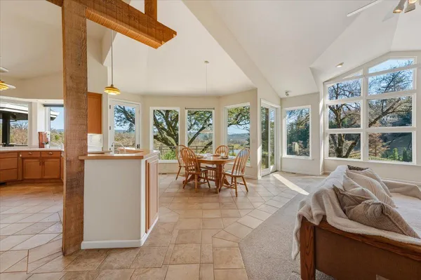 a view of an entryway with furniture and front door