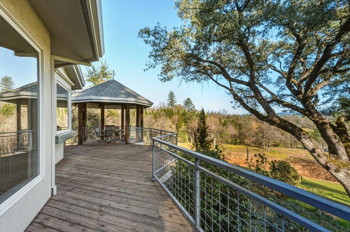 14771 Mt Olive Road Grass Valley, CA 95945 - Photo 46 of 96 Pergola for al fresco dining to take in the pond and views. Ample deck for entertaining and enjoying your surroundings.