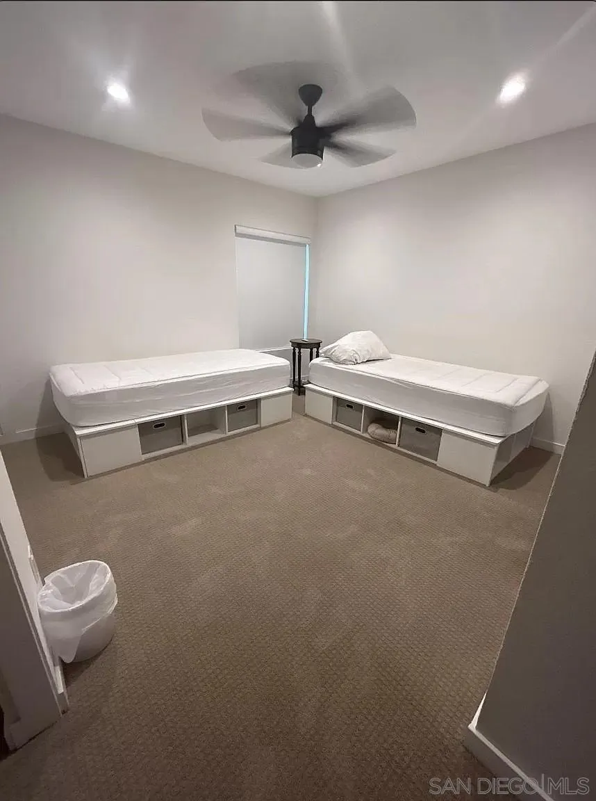 5462 Adobe Falls Road, Unit 11 San Diego, CA 92120 - Photo 11 of 19 a bathroom with a toilet and a shower