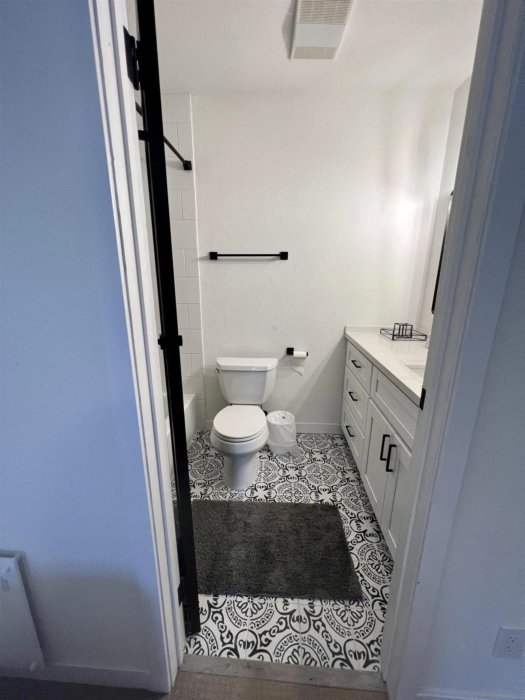 5462 Adobe Falls Road, Unit 11 San Diego, CA 92120 - Photo 12 of 19 a bathroom with a sink and a toilet