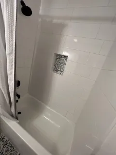 a bathroom with a bathtub
