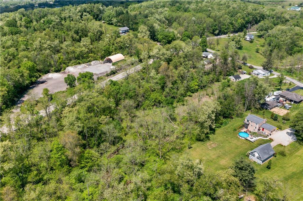 20 Coleman Road McDonald, PA 15057 - Photo 28 of 39 an aerial view of residential house with outdoor space and trees all around