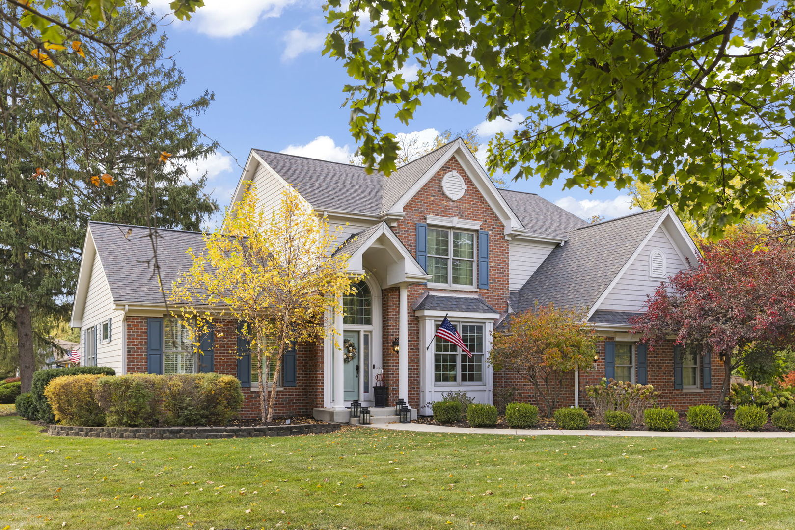 N436 Willow Road Wheaton, IL 60187 - Photo 1 of 34 a front view of a house with a yard