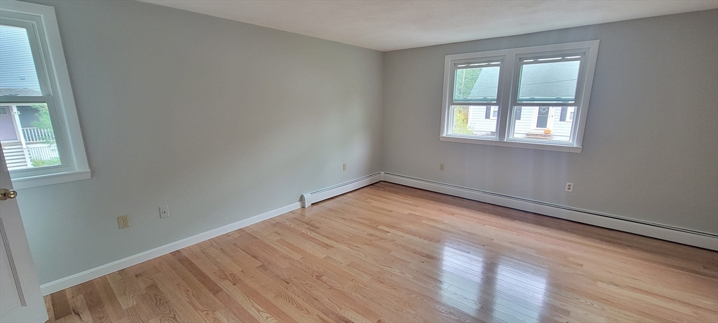 35 Park Avenue Reading, MA 01867 - Photo 5 of 15 an empty room with a window