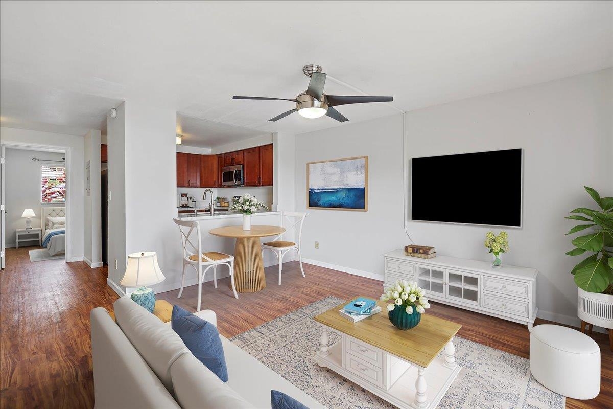 2747 South Kihei Road, Unit A107 Kihei, HI 96753 - Photo 1 of 46 a living room with furniture and a flat screen tv
