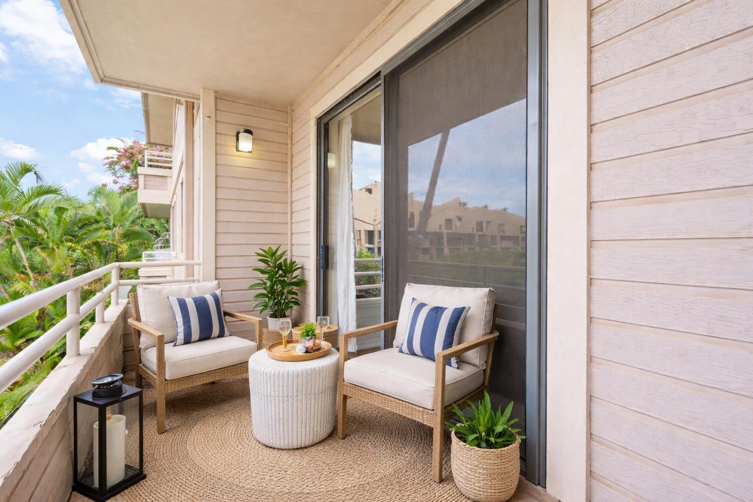 2747 South Kihei Road, Unit A107 Kihei, HI 96753 - Photo 25 of 46 a living room with furniture and a potted plant