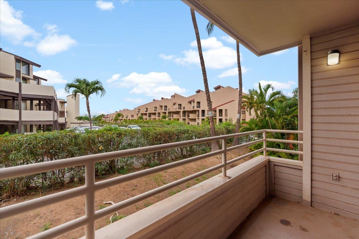2747 South Kihei Road, Unit A107 Kihei, HI 96753 - Photo 28 of 46 a view of a balcony with chairs
