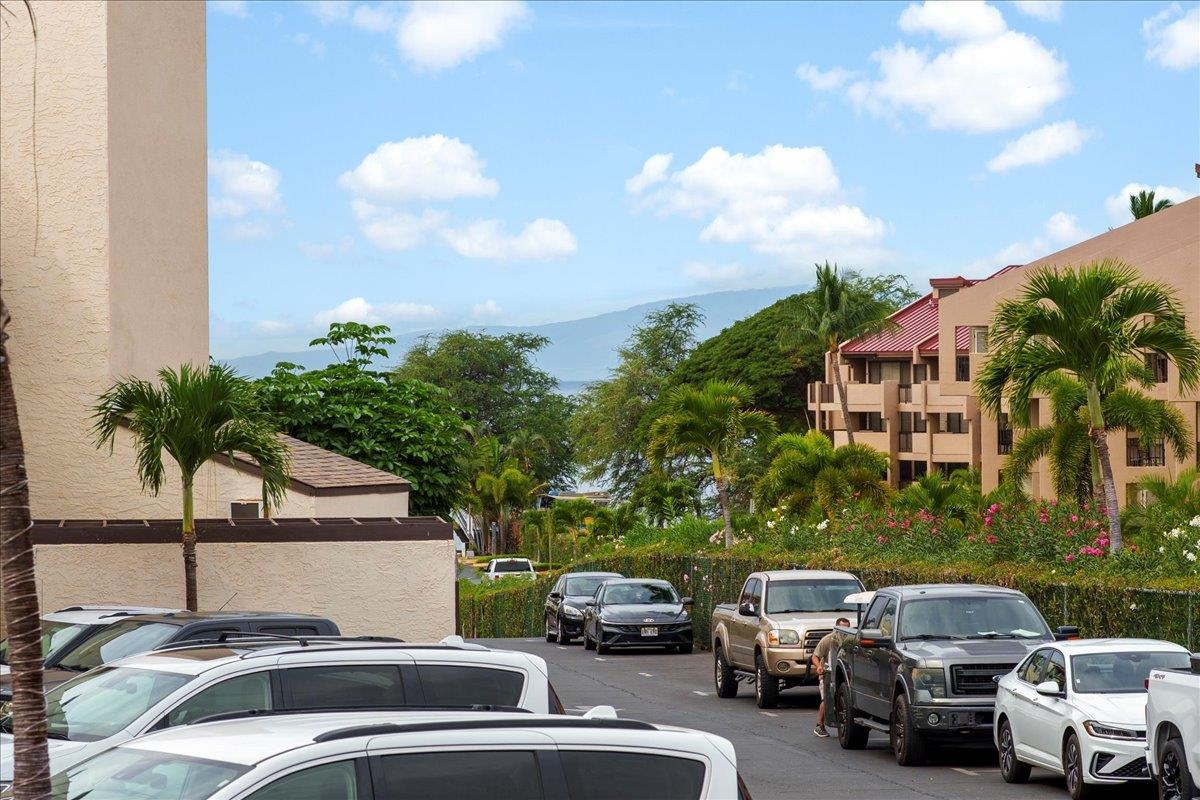 2747 South Kihei Road, Unit A107 Kihei, HI 96753 - Photo 30 of 46 a car parked in front of a house