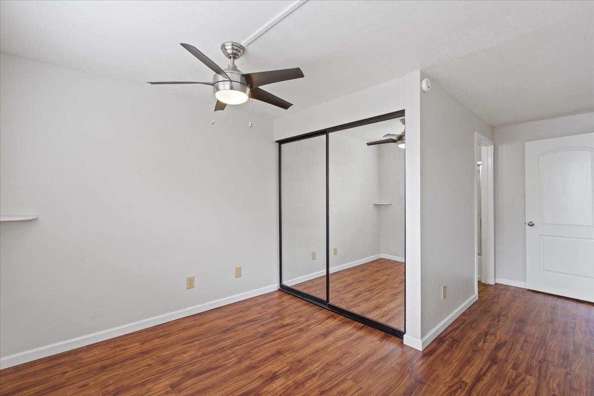 2747 South Kihei Road, Unit A107 Kihei, HI 96753 - Photo 34 of 46 a view of a hallway with wooden floor and closet