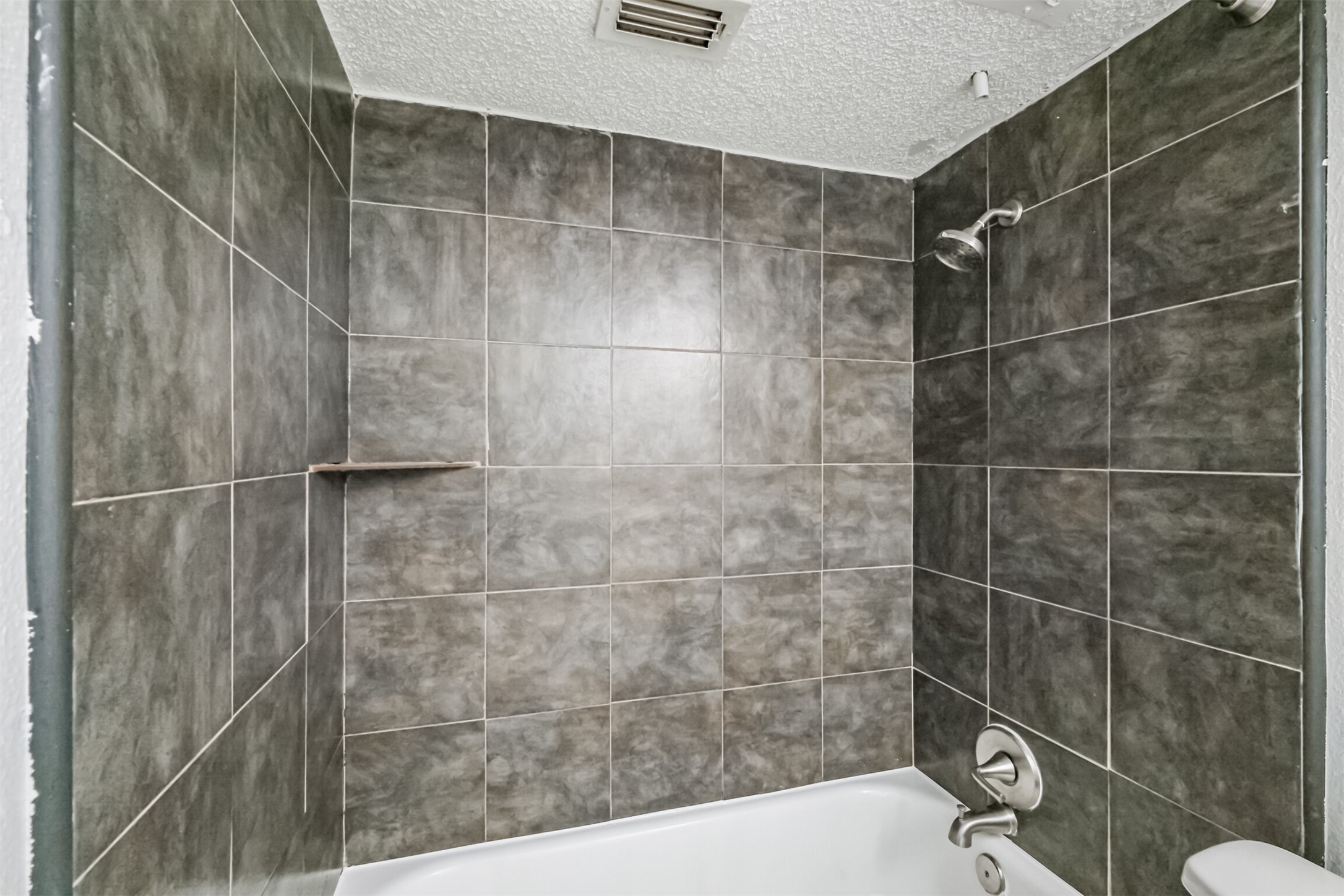 3100 Jeanetta Street, Unit 1305 Houston, TX 77063 - Photo 17 of 21 a bathroom with a shower