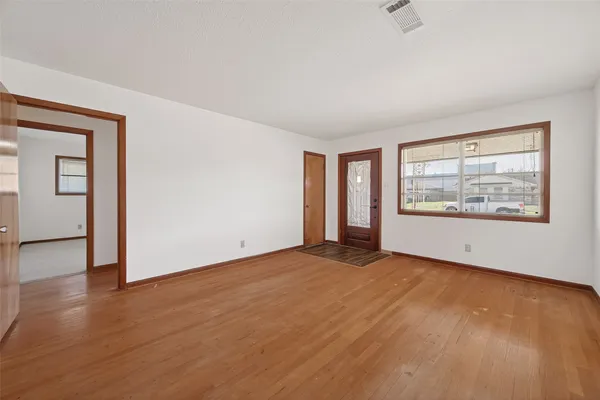 an empty room with window