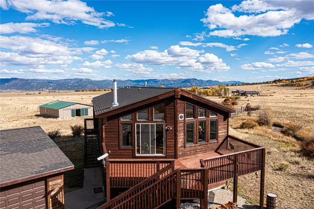 a view of a house with a roof deck