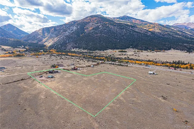 a view of a large space in front of a house