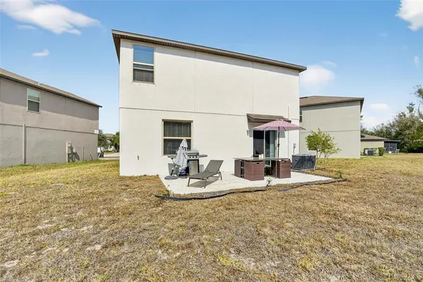 a view of a street with houses on both side