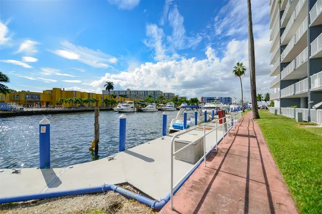 a view of a yard with swimming pool