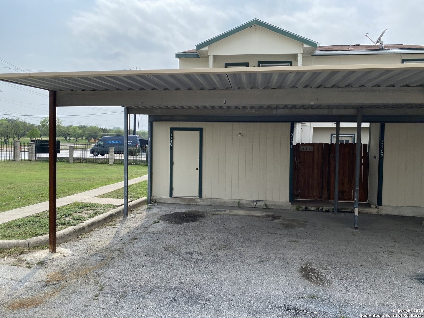 4949 Hamilton Wolfe Road, Unit 5201 San Antonio, TX 78229 - Photo 20 of 29 a view of a house with a floor and wooden fence