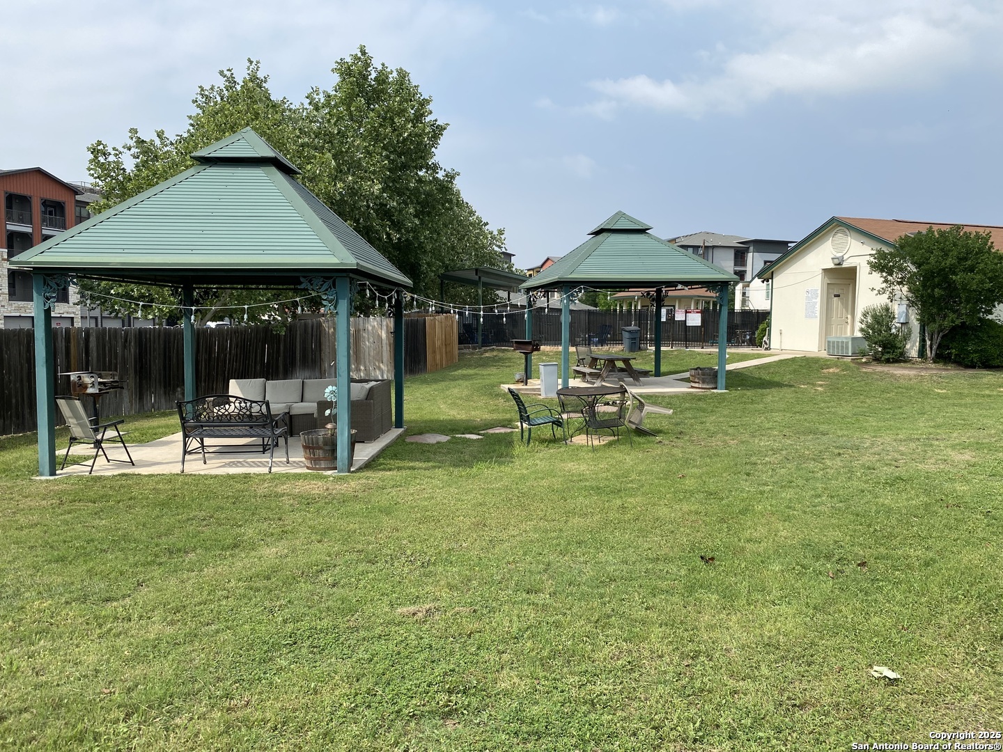 4949 Hamilton Wolfe Road, Unit 5201 San Antonio, TX 78229 - Photo 22 of 29 a swimming pool view with a seating space