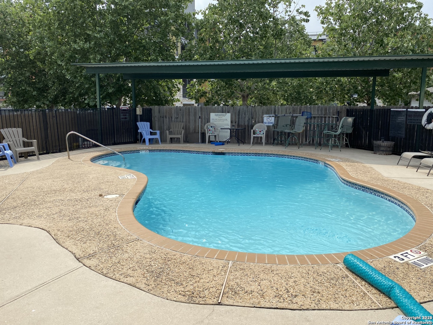 4949 Hamilton Wolfe Road, Unit 5201 San Antonio, TX 78229 - Photo 24 of 29 a view of outdoor space with swimming pool