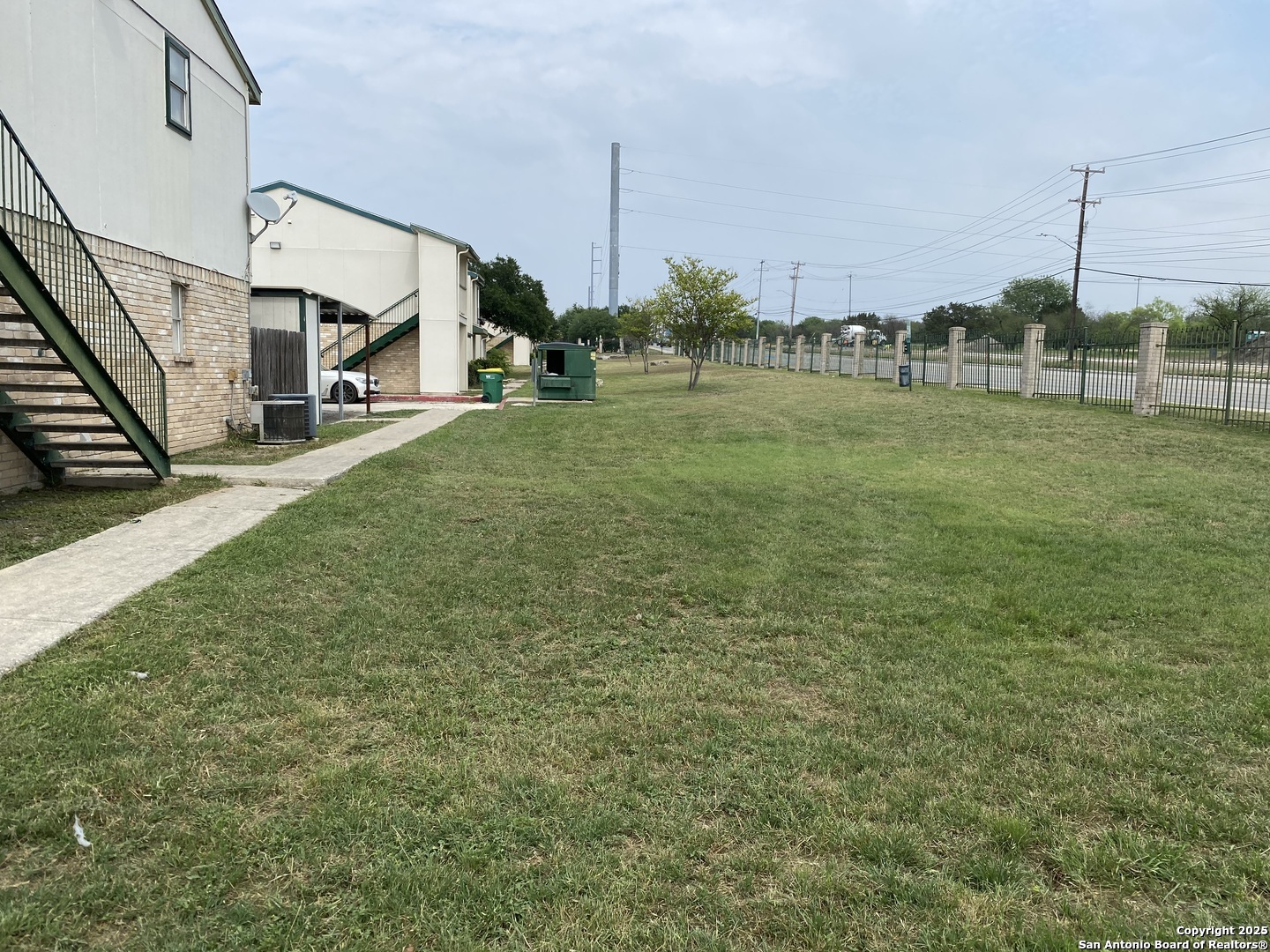4949 Hamilton Wolfe Road, Unit 5201 San Antonio, TX 78229 - Photo 3 of 29 a view of a green field