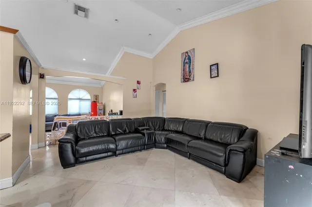 a living room with furniture and a couch