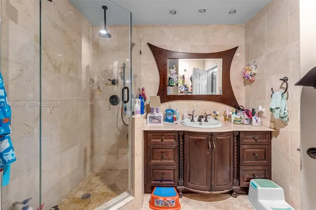 a bathroom with a bathtub and a sink