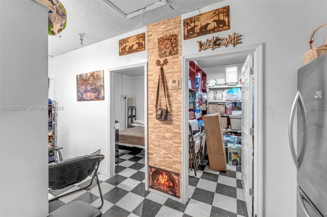 a bedroom with a bed and furniture