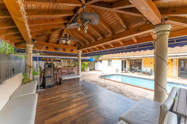 a view of a porch with wooden floor