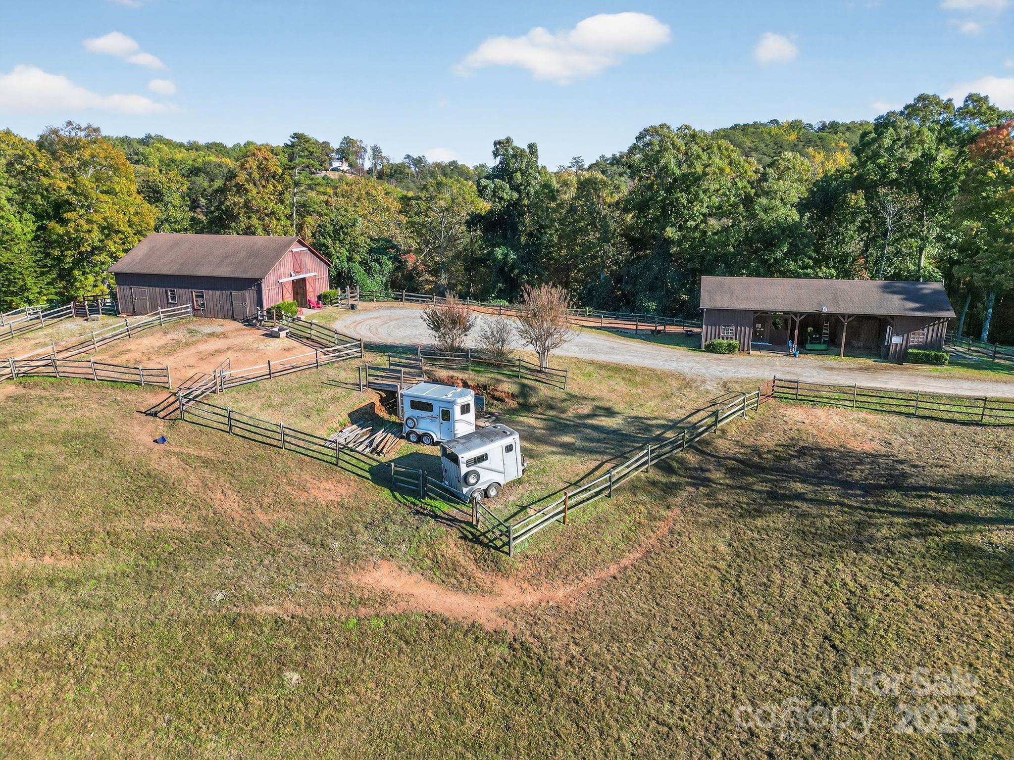 777 South River Road Tryon, NC 28782 - Photo 12 of 42 a view of a swimming pool with a yard