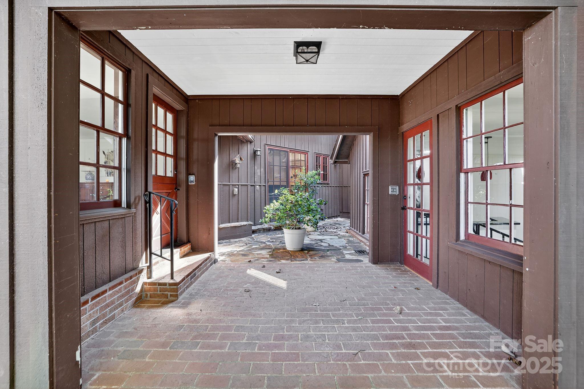 777 South River Road Tryon, NC 28782 - Photo 21 of 42 a view of a entryway door of the house