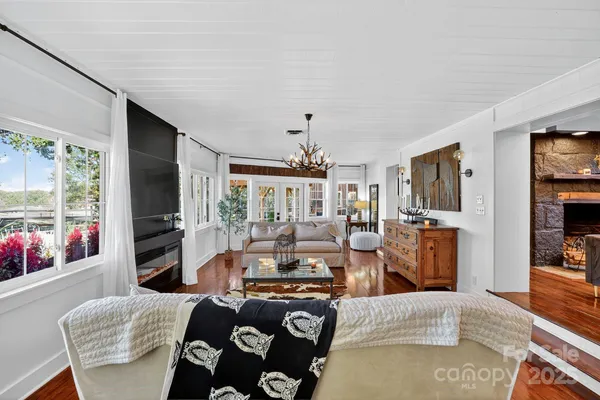a kitchen with stainless steel appliances granite countertop a refrigerator and a cabinets
