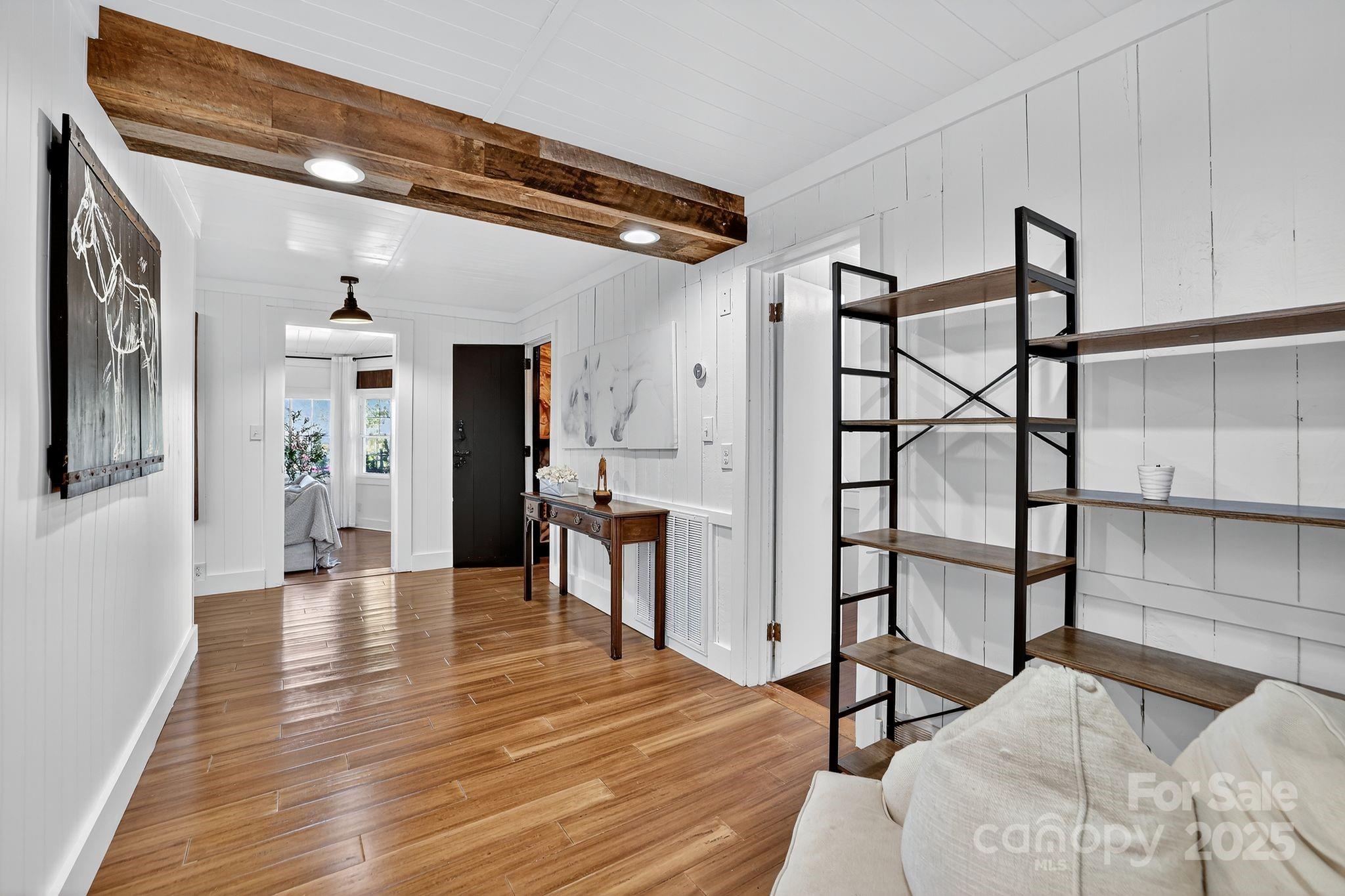 777 South River Road Tryon, NC 28782 - Photo 28 of 42 a view of a livingroom with furniture and stairs