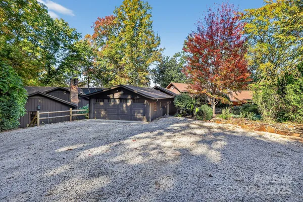a house with a tree in front of it