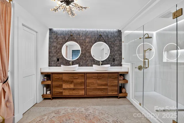 a view of a balcony with wooden floor and fence