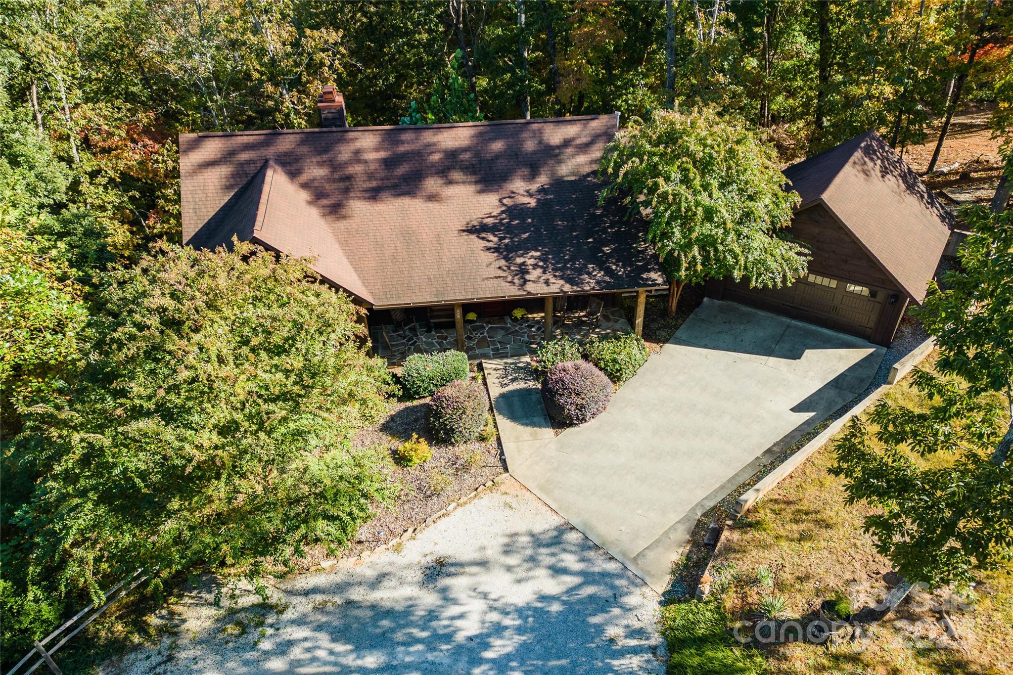777 South River Road Tryon, NC 28782 - Photo 32 of 47 a view of a backyard with sitting area
