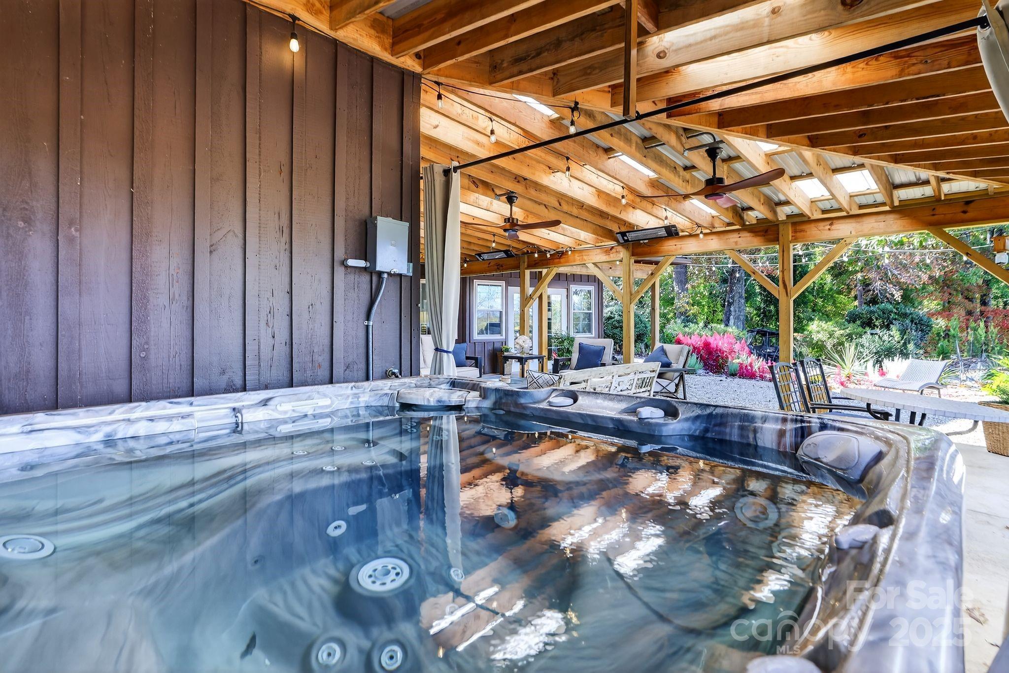 777 South River Road Tryon, NC 28782 - Photo 34 of 42 a view of swimming pool with seating area