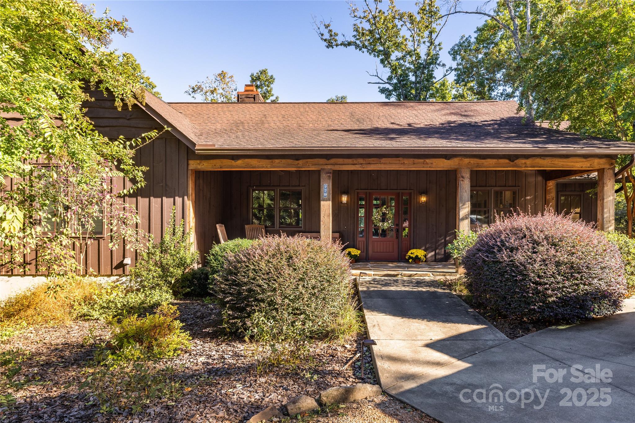 777 South River Road Tryon, NC 28782 - Photo 37 of 47 a view of a house with potted plants