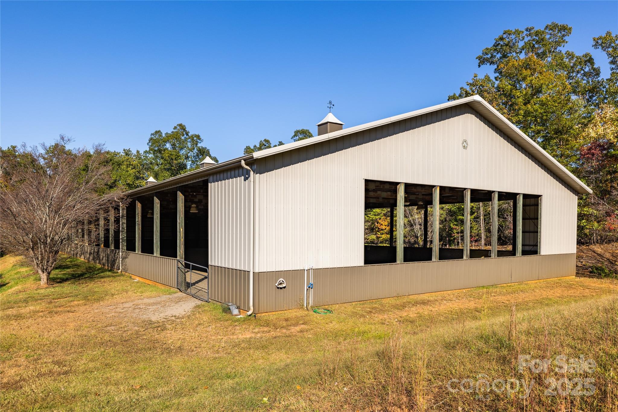777 South River Road Tryon, NC 28782 - Photo 41 of 42 a view of white house with a yard