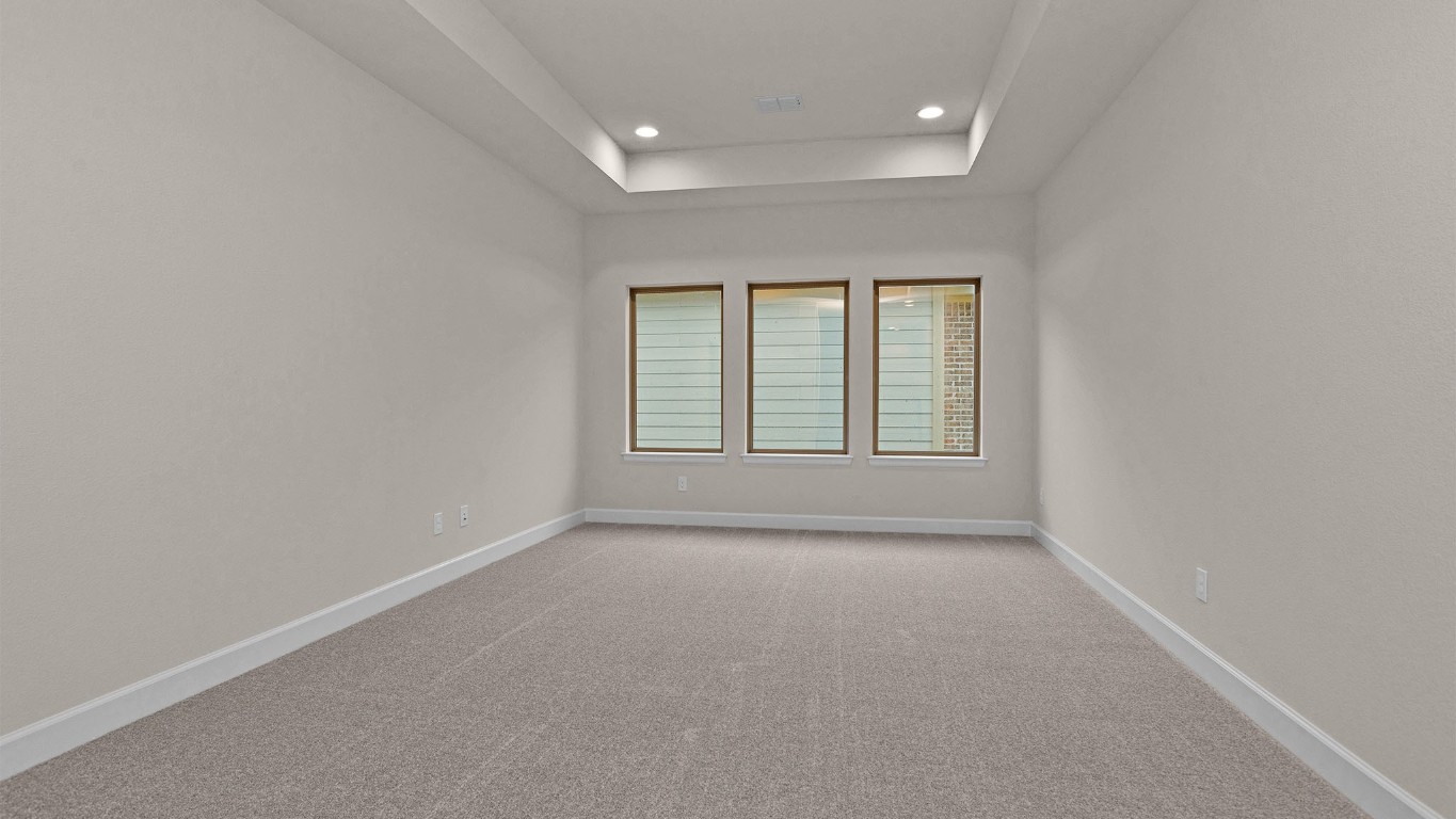 6539 Sparkling Citrus Street Manvel, TX 77578 - Photo 12 of 21 an empty room with windows