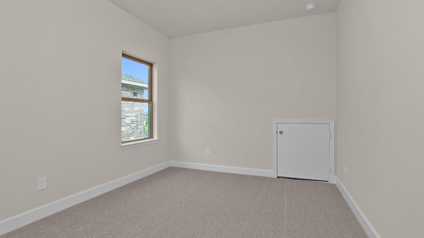 6539 Sparkling Citrus Street Manvel, TX 77578 - Photo 15 of 21 an empty room with windows