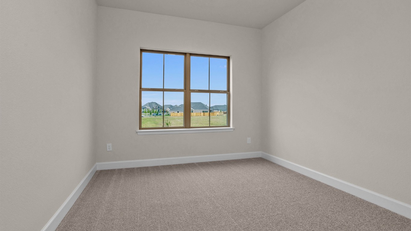 6539 Sparkling Citrus Street Manvel, TX 77578 - Photo 16 of 21 an empty room with windows
