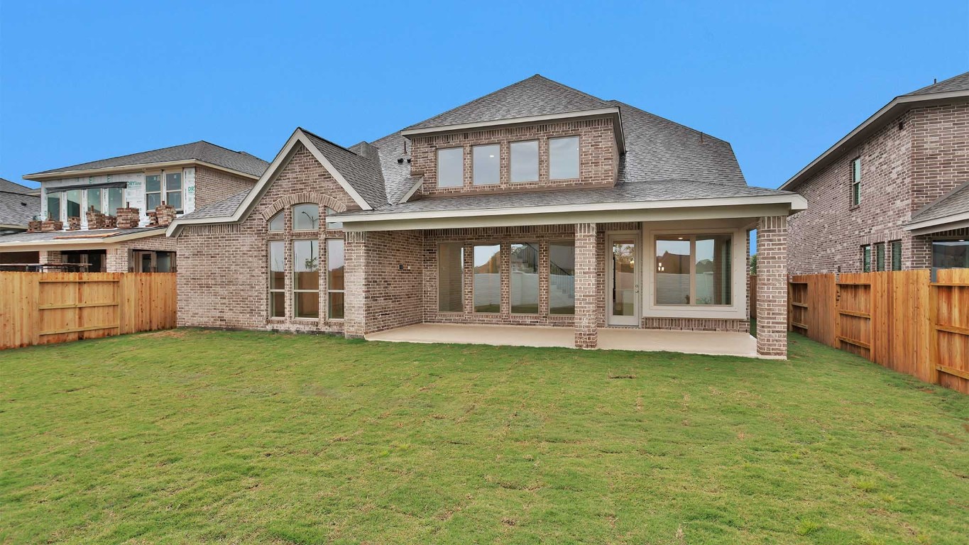 6539 Sparkling Citrus Street Manvel, TX 77578 - Photo 18 of 21 a front view of a house with a garden
