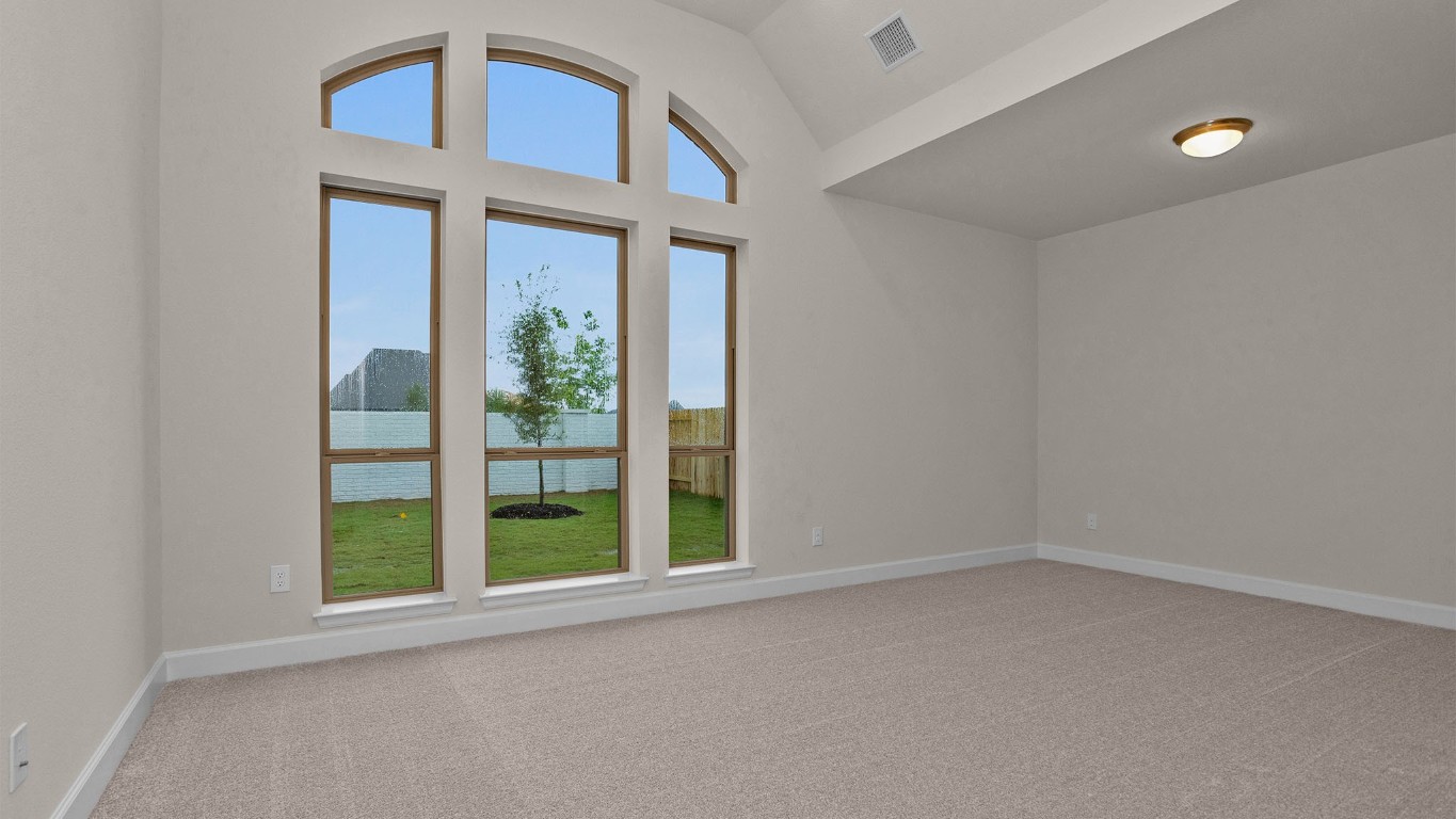 6539 Sparkling Citrus Street Manvel, TX 77578 - Photo 9 of 21 an empty room with a window